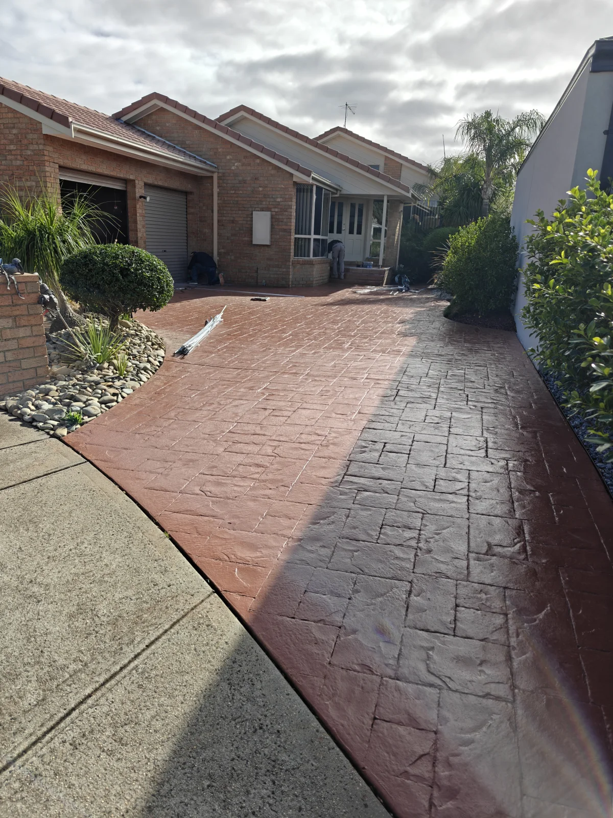 Stamped concrete driveway before resurfacing